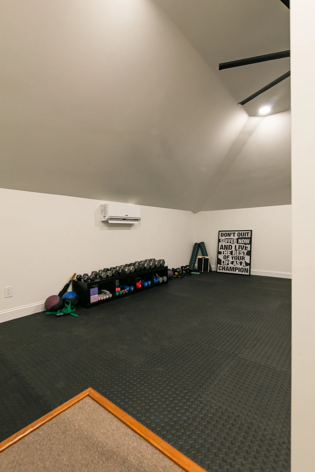 The attic gym after remodeling by VanFleet Homes in Ford’s Colony