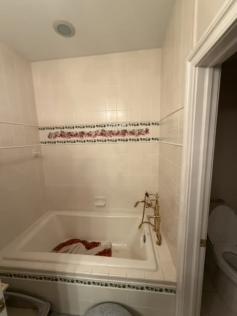Tub to walk-in shower before the Ford’s Colony renovation