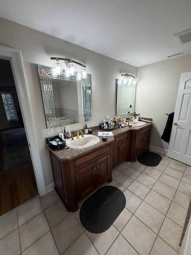 The primary vanity before the Ford’s Colony renovation