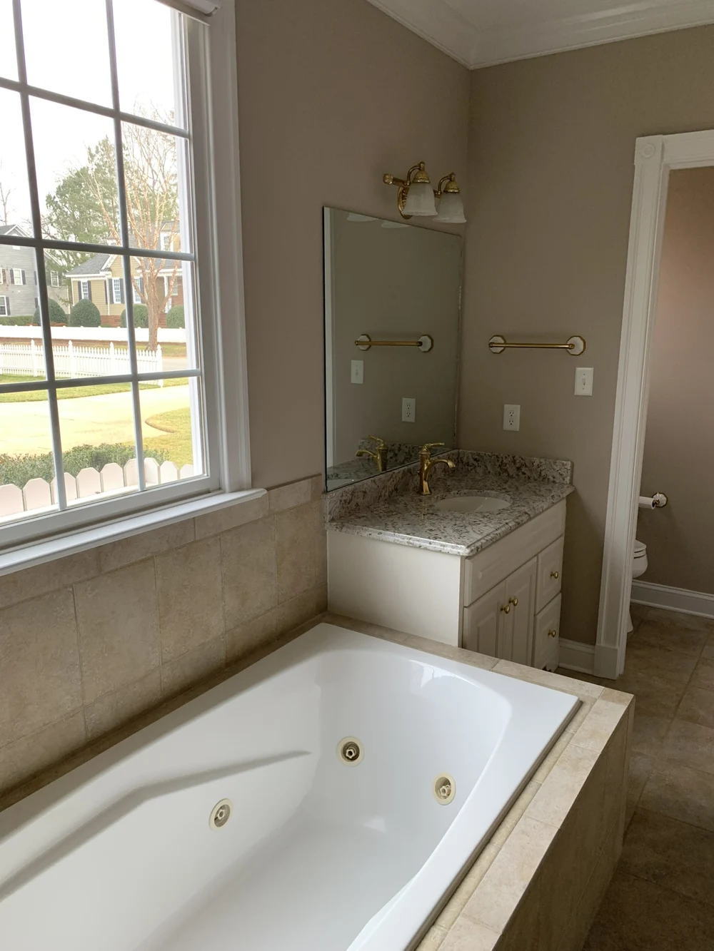 The tub-side vanity before the Ford’s Colony renovation