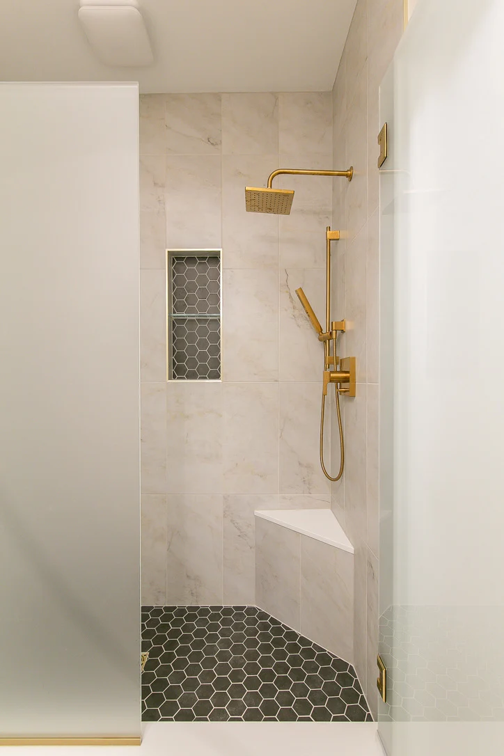 From tub to walk-in shower after remodeling by VanFleet Homes in Ford’s Colony