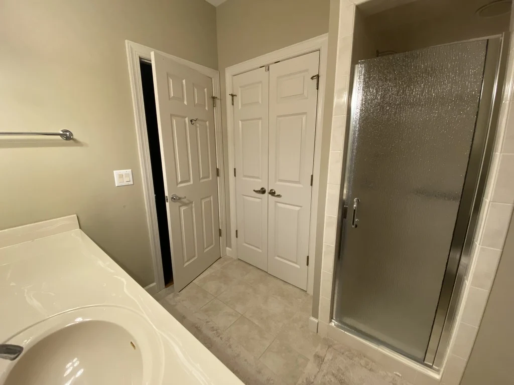 From shower to tub & shower before the Holly Grove renovation