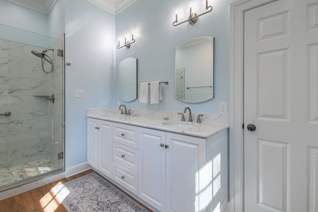 The vanity wall after remodeling by VanFleet Homes in The Cove