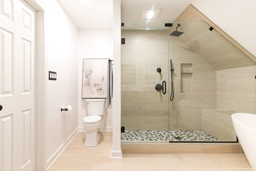 The shower transformation after remodeling by VanFleet Homes in Kingsmill