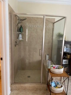 The shower transformation before the Greensprings West renovation